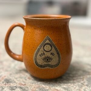 Artisan Crafted Orange Speckled Ceramic Mug with Ouija Eye Planchette Design
